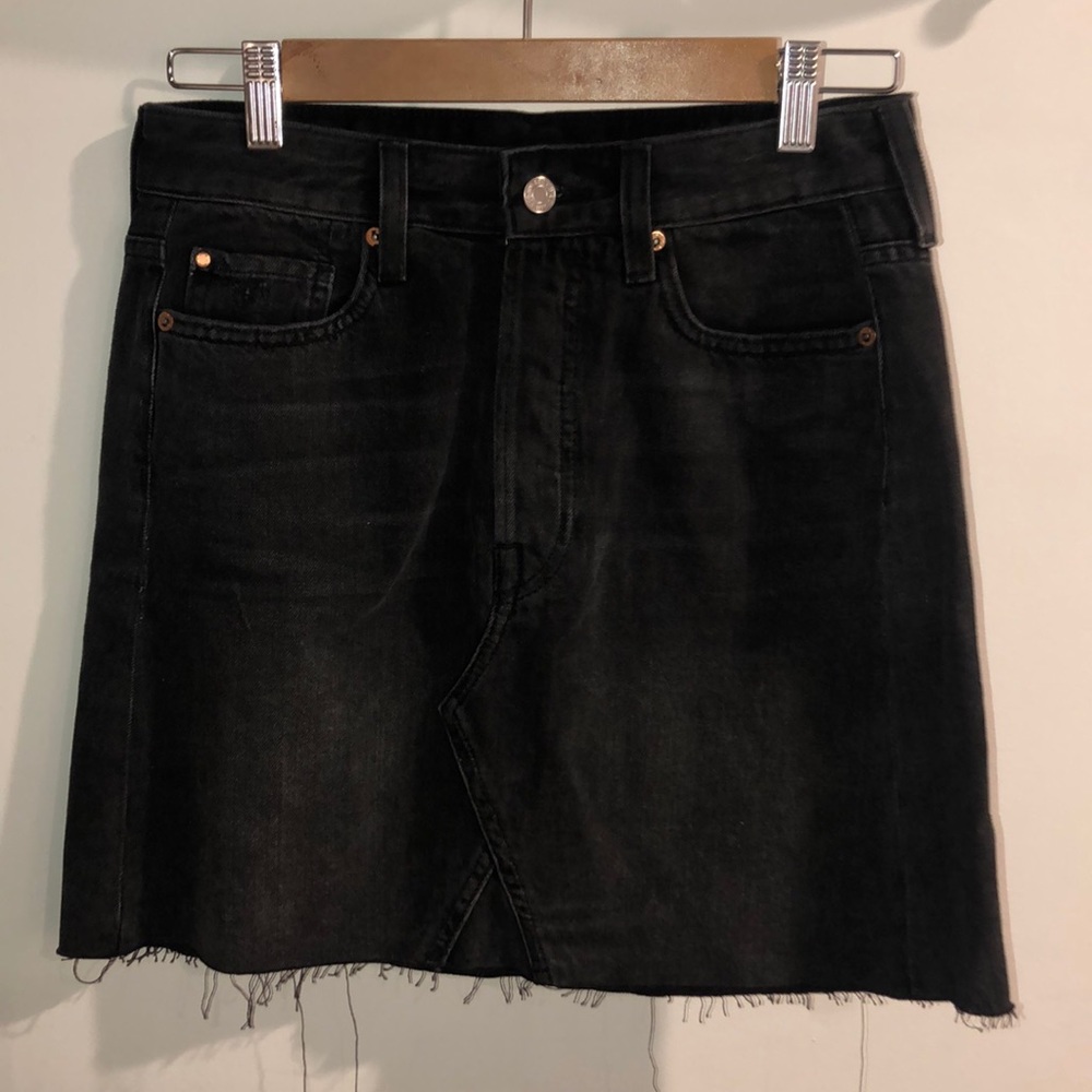 Black distressed jean mini skirt